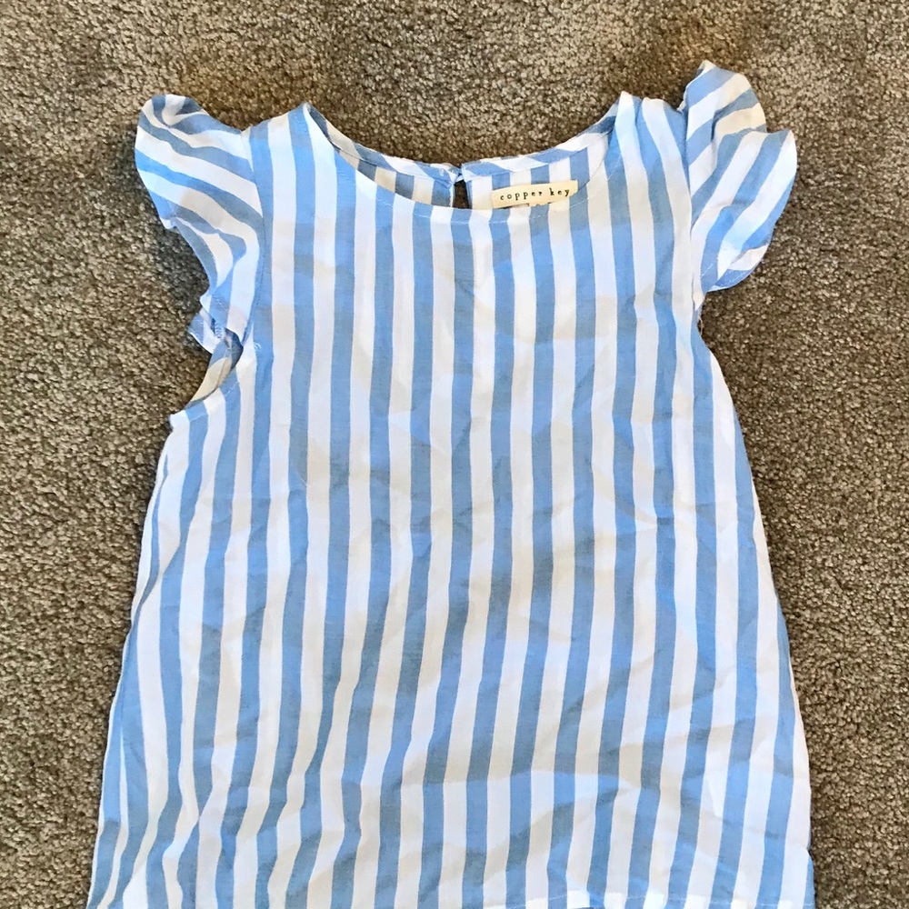 White and blue copper key shirt.
